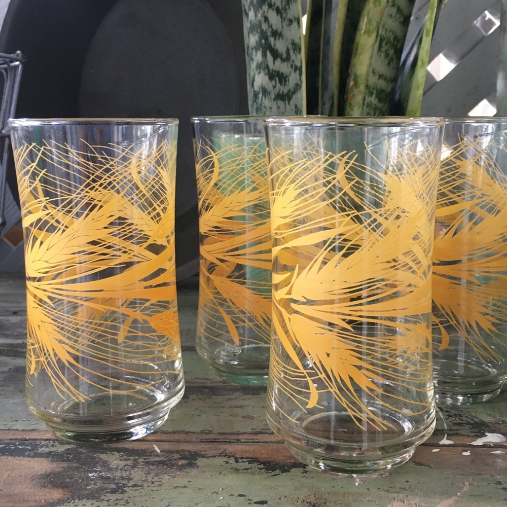 Set of 4 Libbey gold wheat 12 ozs glasses.
